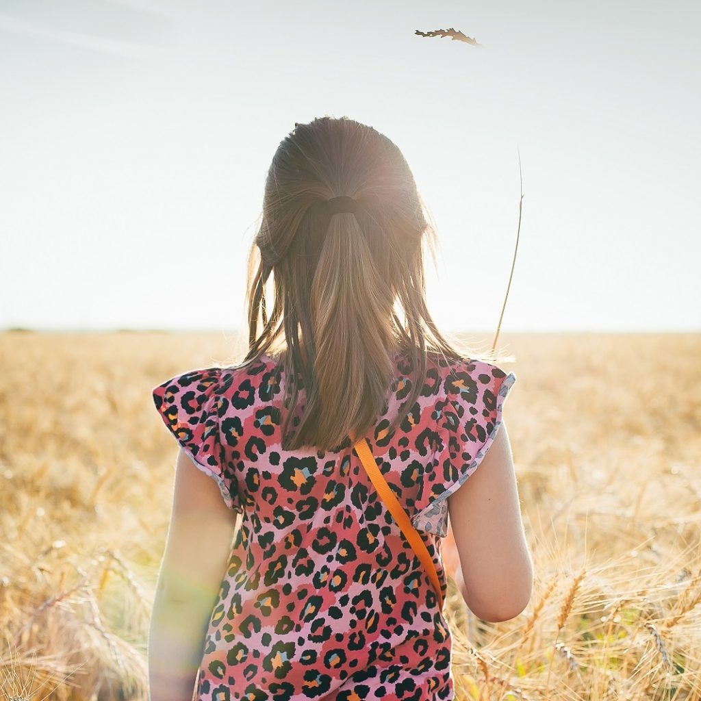 little-girl-from-the-back-on-wheat-field-summer-o-2021-08-28-20-47-43-utc-Cropped-1024x1024